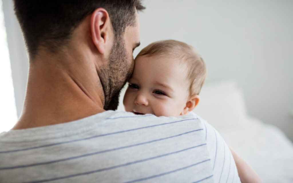 Father holding his baby girl